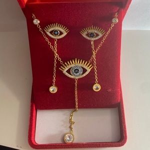 Stainless Steel Gold eye necklace and earrings set